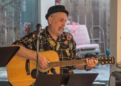 a man playing the guitar